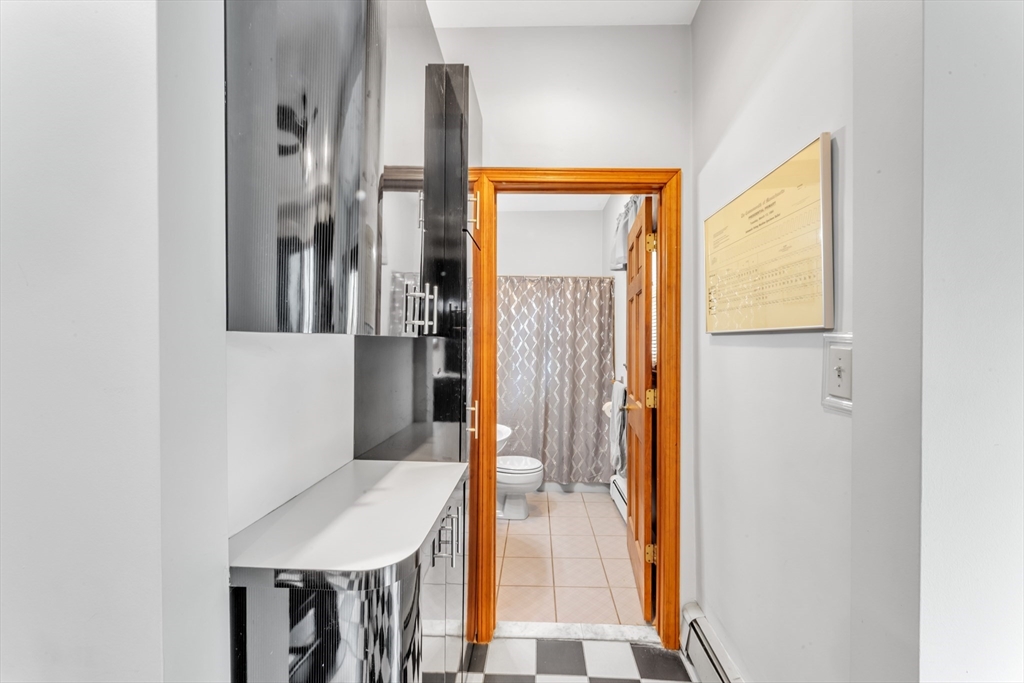 196 Maple Street Boston, MA 02132 - Photo 28 of 33 a very nice looking room with a large window