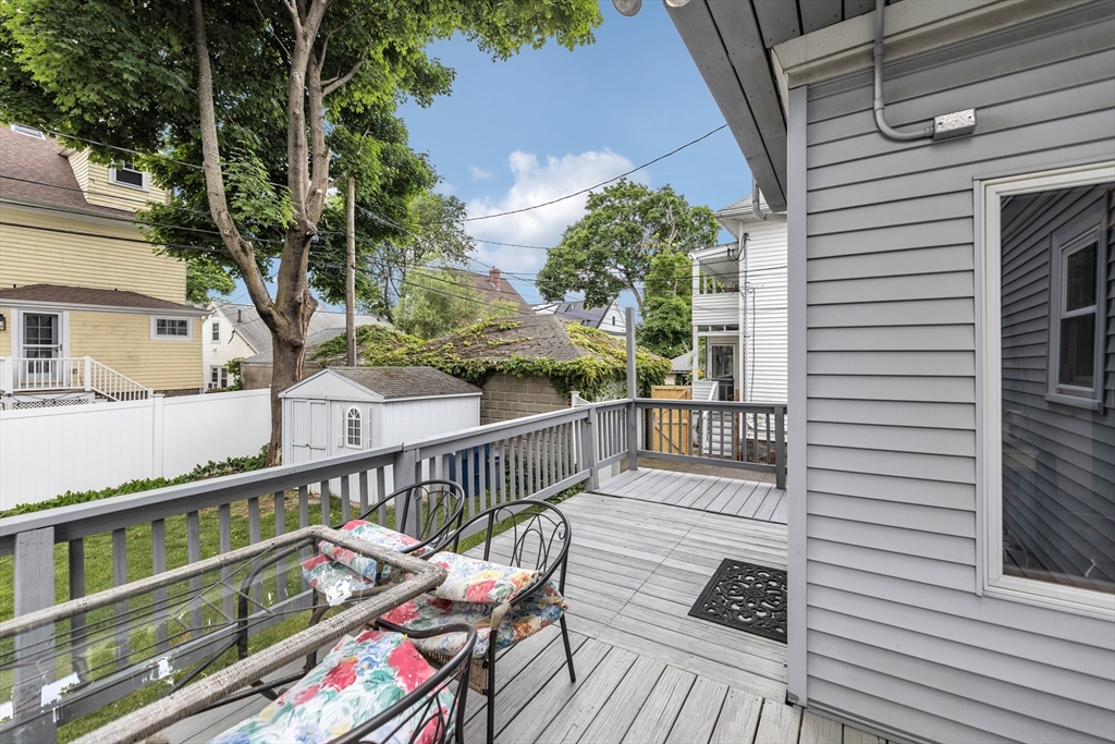 196 Maple Street Boston, MA 02132 - Photo 31 of 33 a view of a balcony with furniture