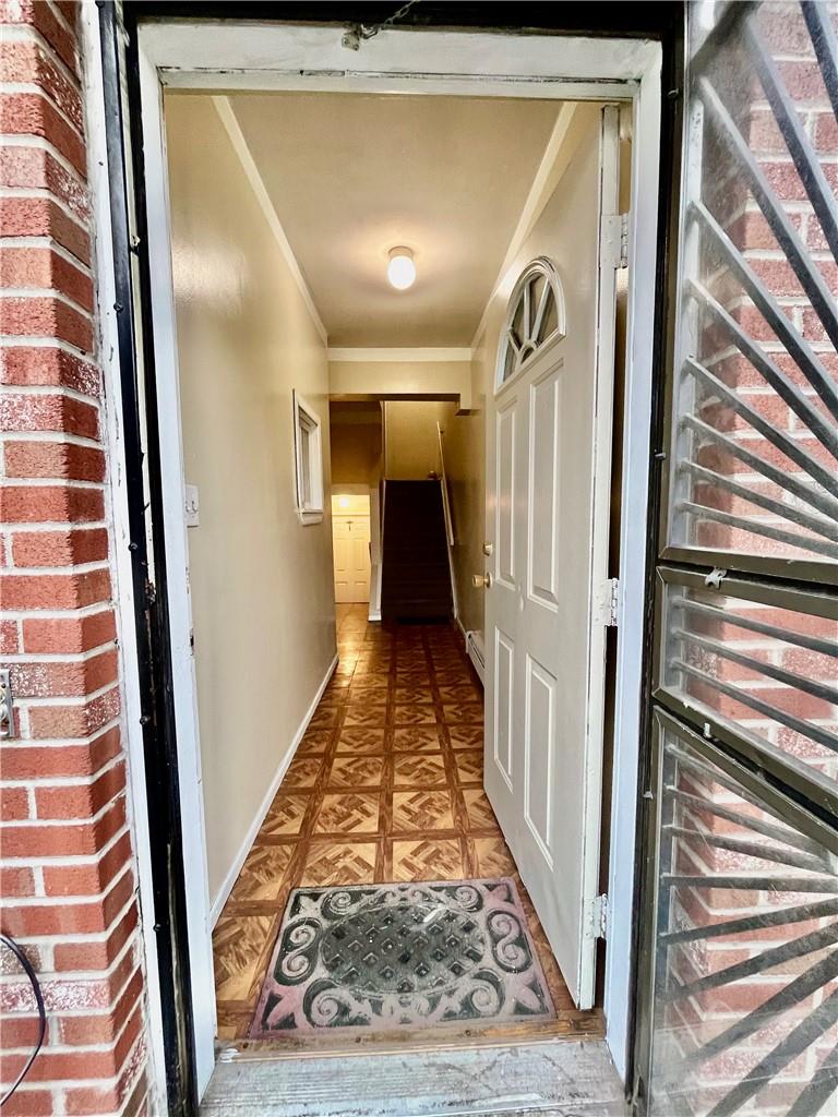 1012 East 172nd Street Bronx, NY 10460 - Photo 20 of 25 Hallway featuring ornamental molding