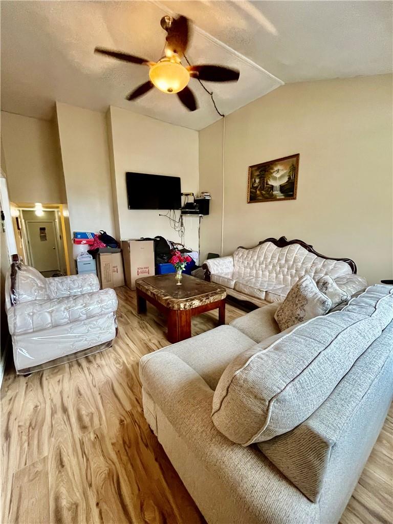 1012 East 172nd Street Bronx, NY 10460 - Photo 4 of 25 Living room featuring ceiling fan and light hardwood / wood-style flooring