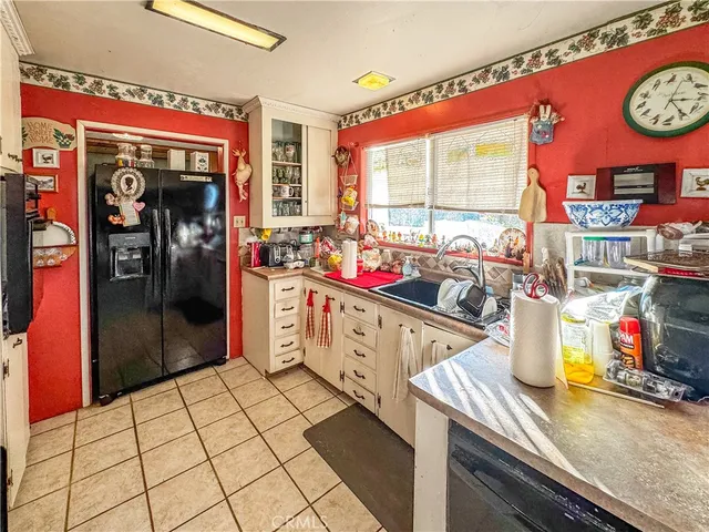 a kitchen with lots of appliances