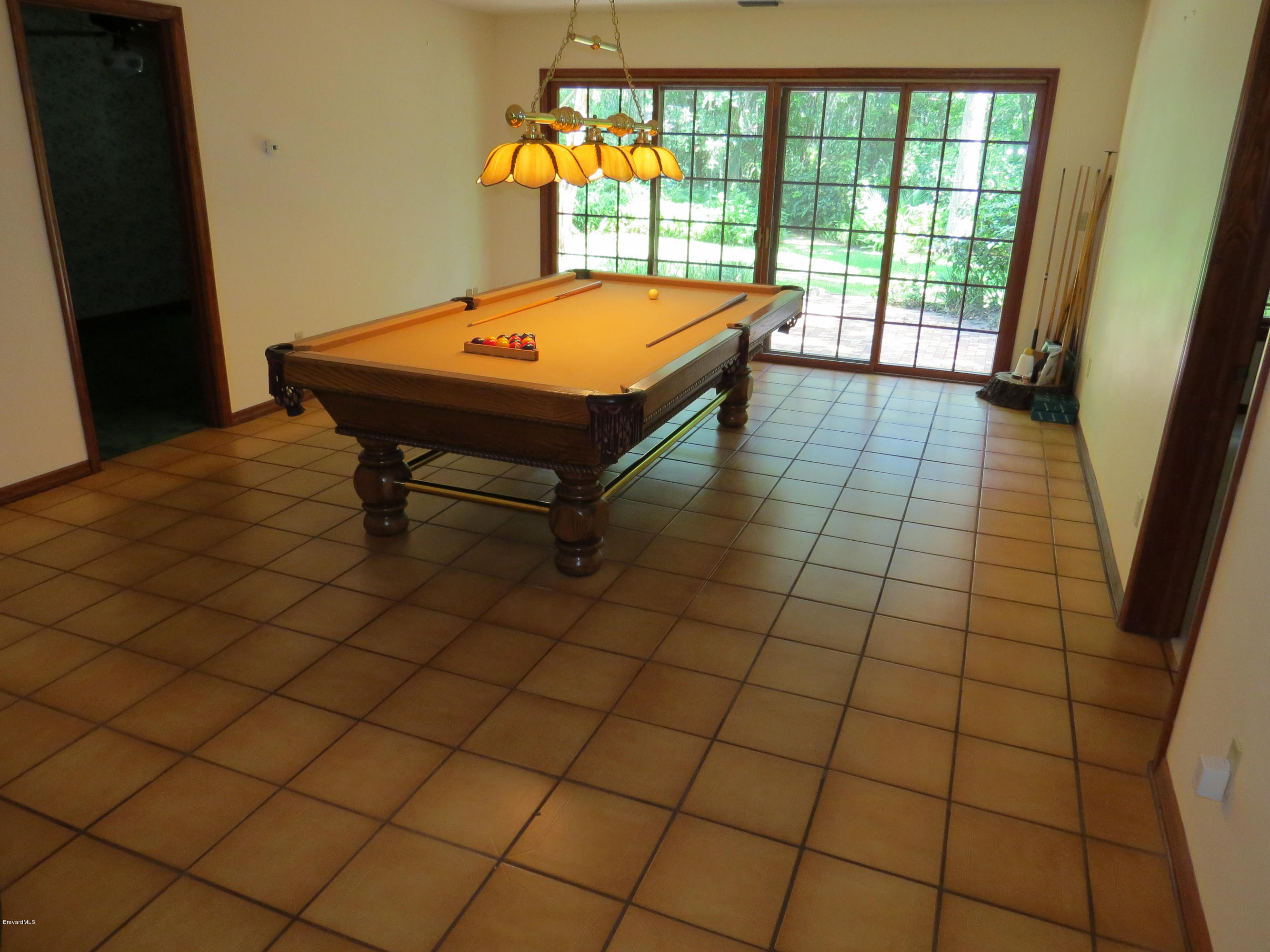 3570 Grant Line Road Mims, FL 32754 - Photo 17 of 48 Downstairs Flex/Billiards