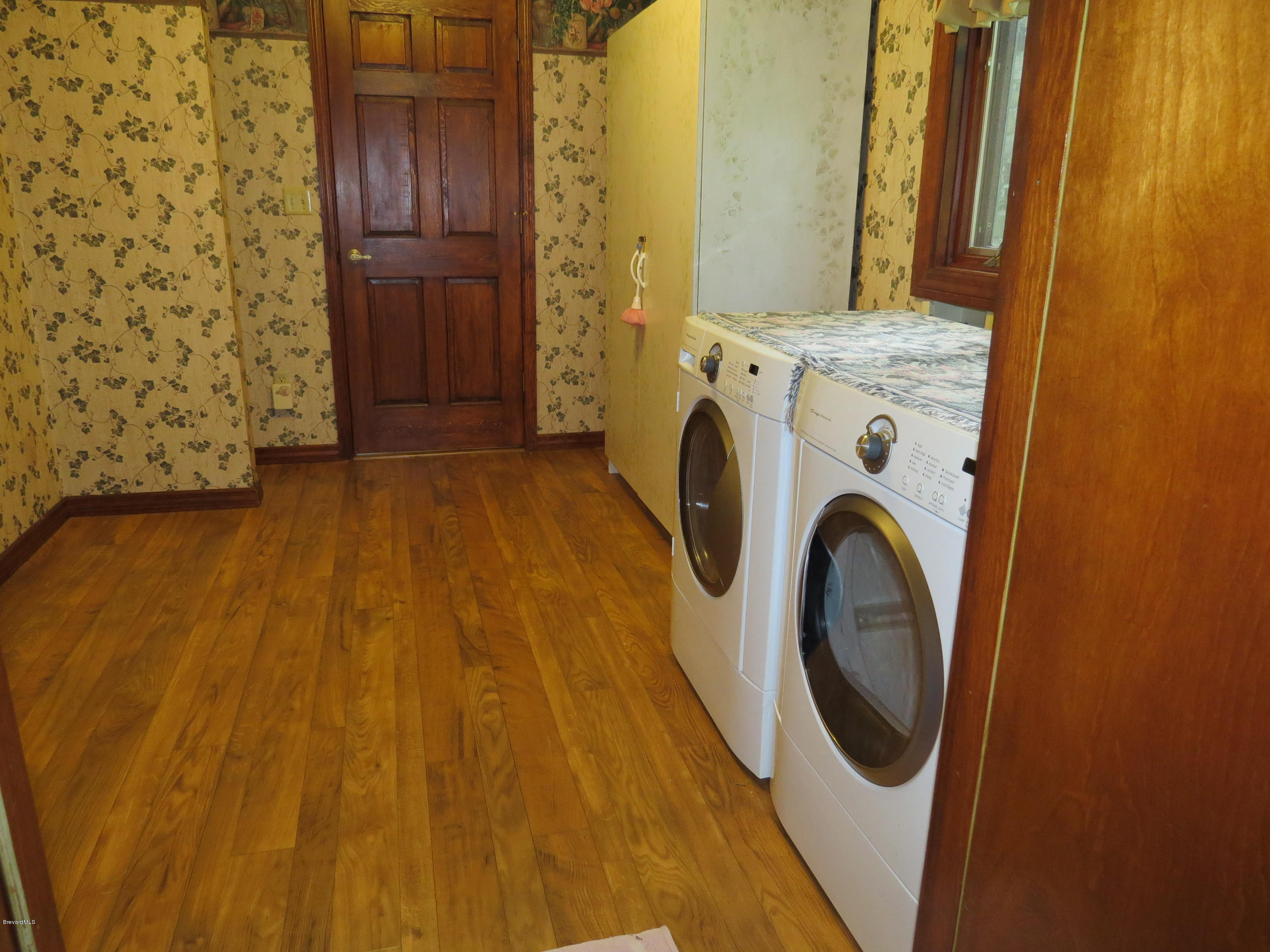 3570 Grant Line Road Mims, FL 32754 - Photo 18 of 48 Downstairs Laundry
