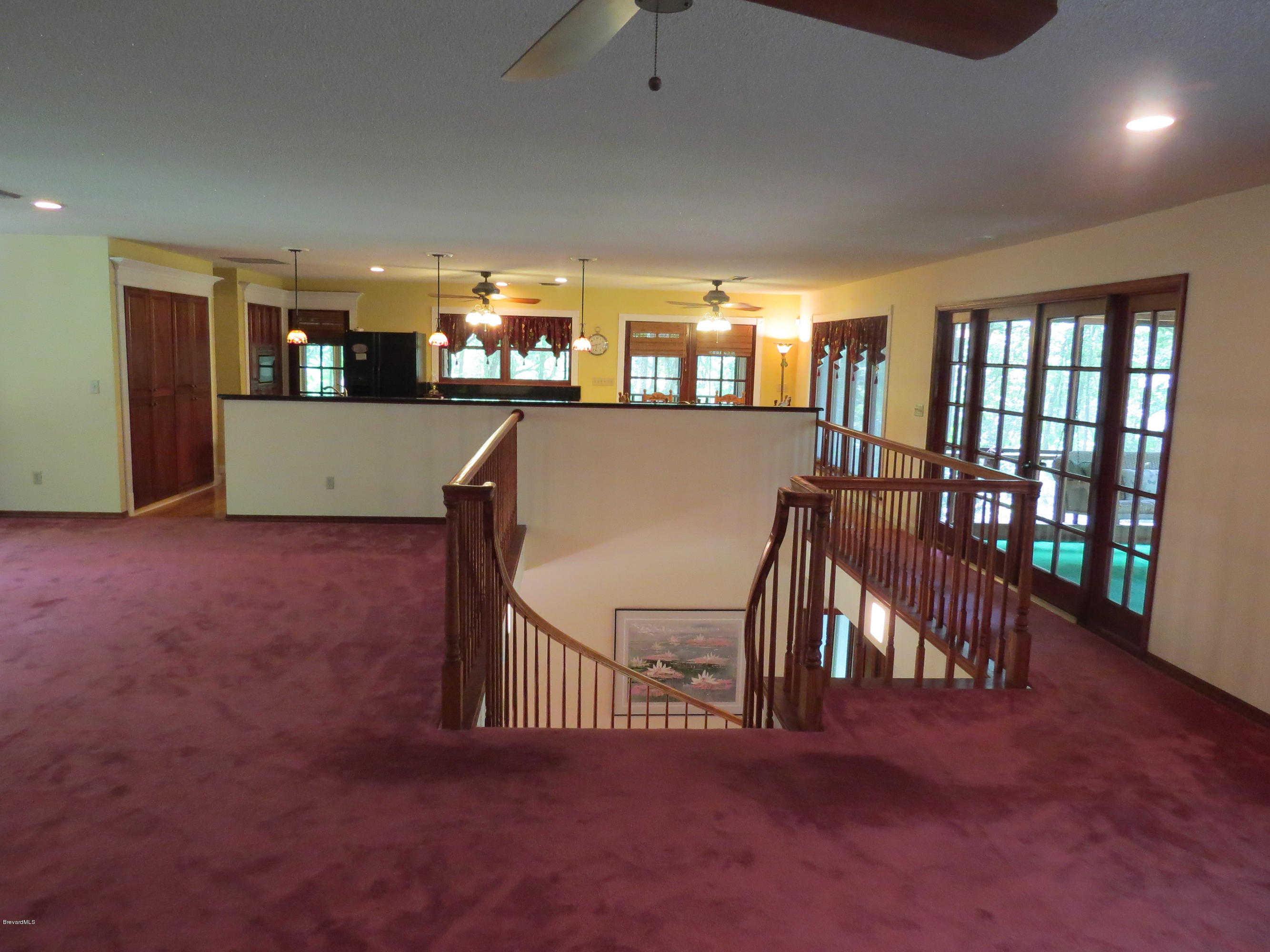 3570 Grant Line Road Mims, FL 32754 - Photo 22 of 48 View From Living Room to Kitchen/Dining