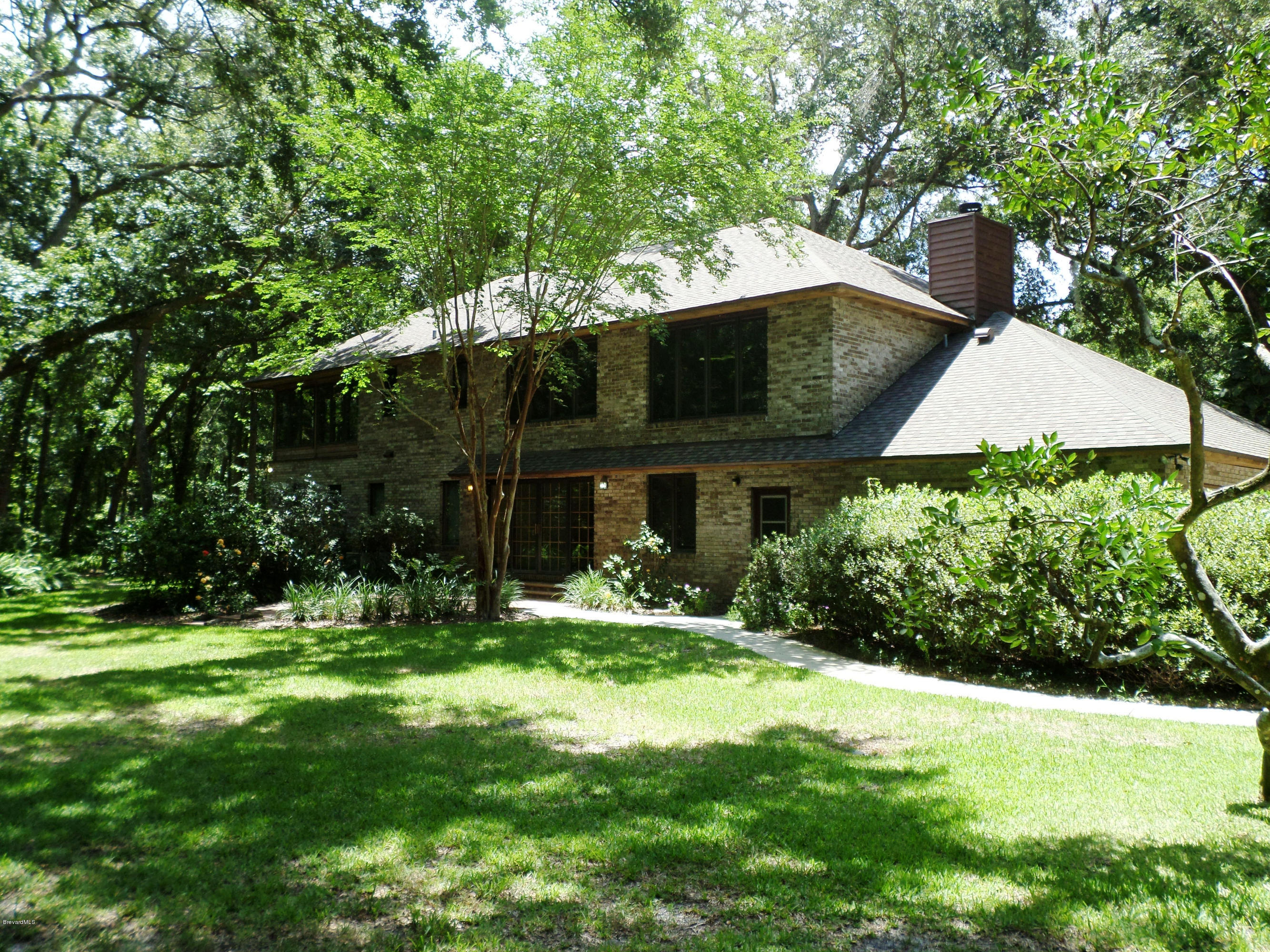 3570 Grant Line Road Mims, FL 32754 - Photo 37 of 48 Home Back View # 2