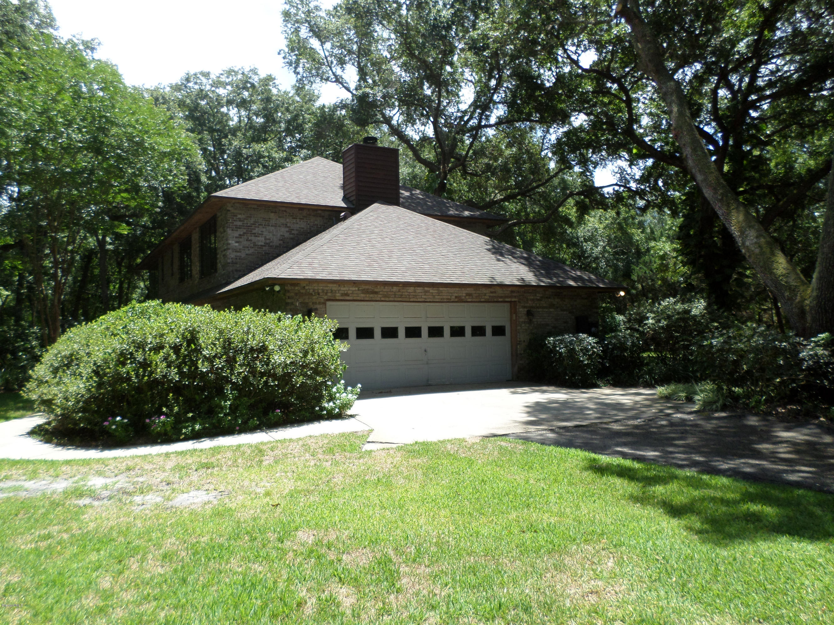3570 Grant Line Road Mims, FL 32754 - Photo 38 of 48 Home Side View