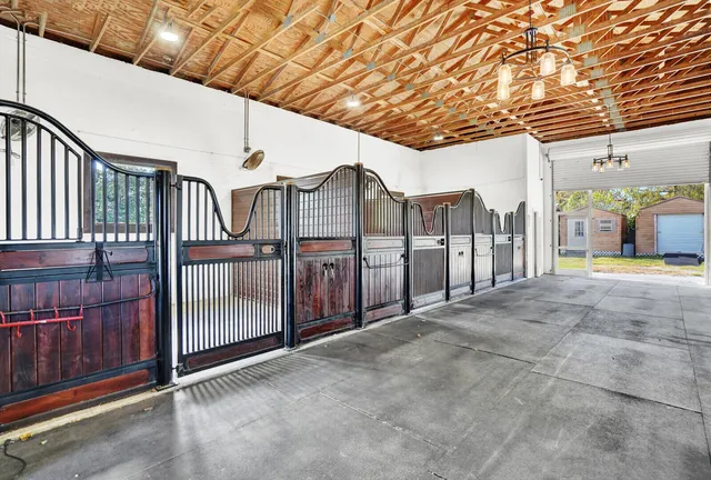 a view of a swimming pool with an outdoor space and seating area