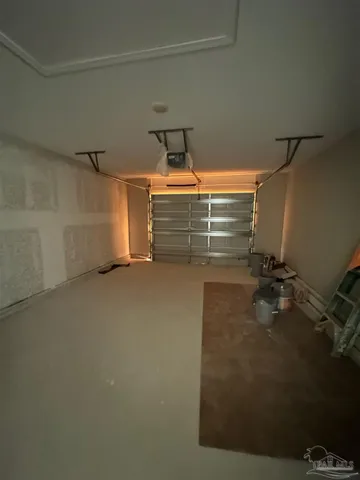 a room with water heater and storage