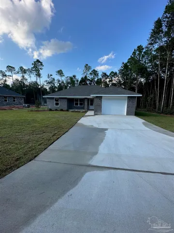 a view of backyard with green space