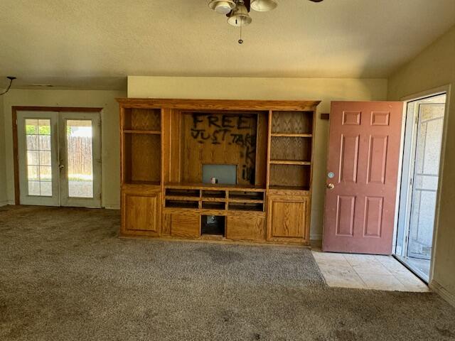 2620 Irwin Road Redding, CA 96002 - Photo 3 of 20 an empty room with a fireplace and cabinet