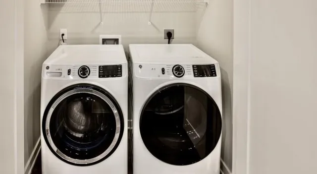 a utility room with dryer and washer