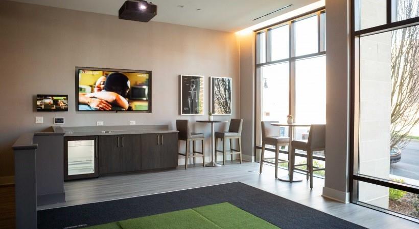 800 Galleria Parkway Southeast, Unit 457 Atlanta, GA 30339 - Photo 26 of 35 a living room with furniture and a flat screen tv