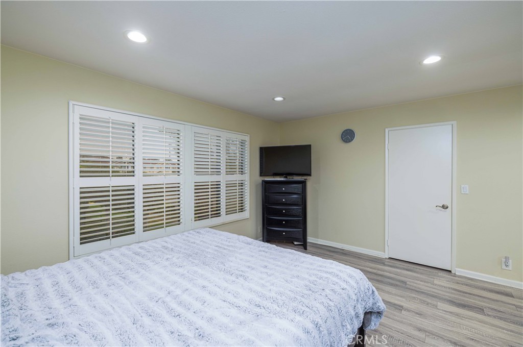12279 Westcliff Drive Stanton, CA 90680 - Photo 17 of 26 a view of a room with furniture and a window