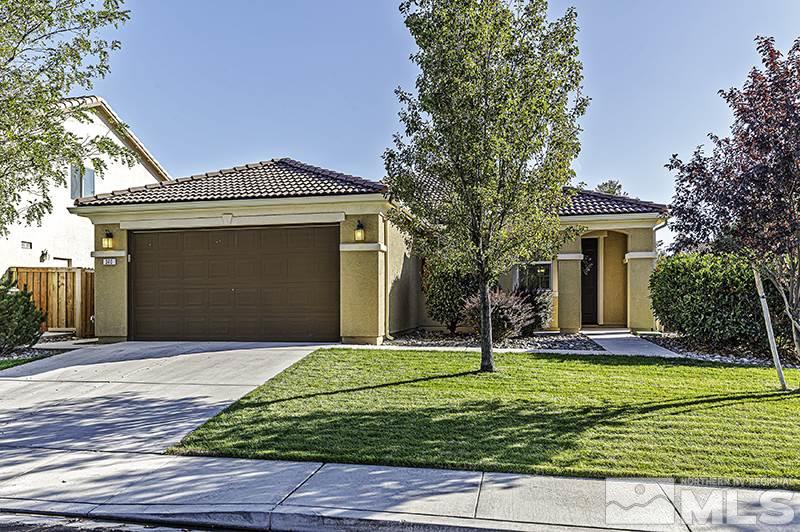 340 Manciano Way Reno, NV 89521 - Photo 1 of 15 a front view of a house with a yard