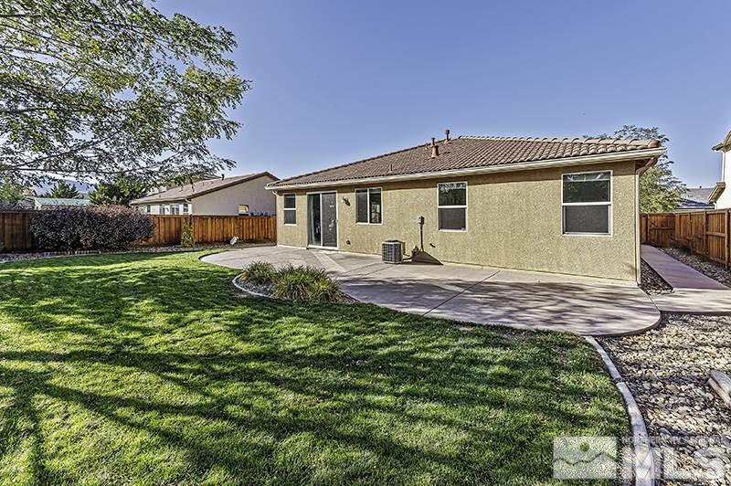 340 Manciano Way Reno, NV 89521 - Photo 15 of 15 a front view of a house with a yard