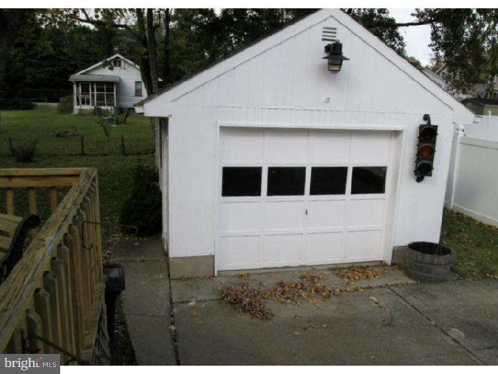 731 Iszard Road Deptford, NJ 08096 - Photo 9 of 20 a front view of a house with a yard
