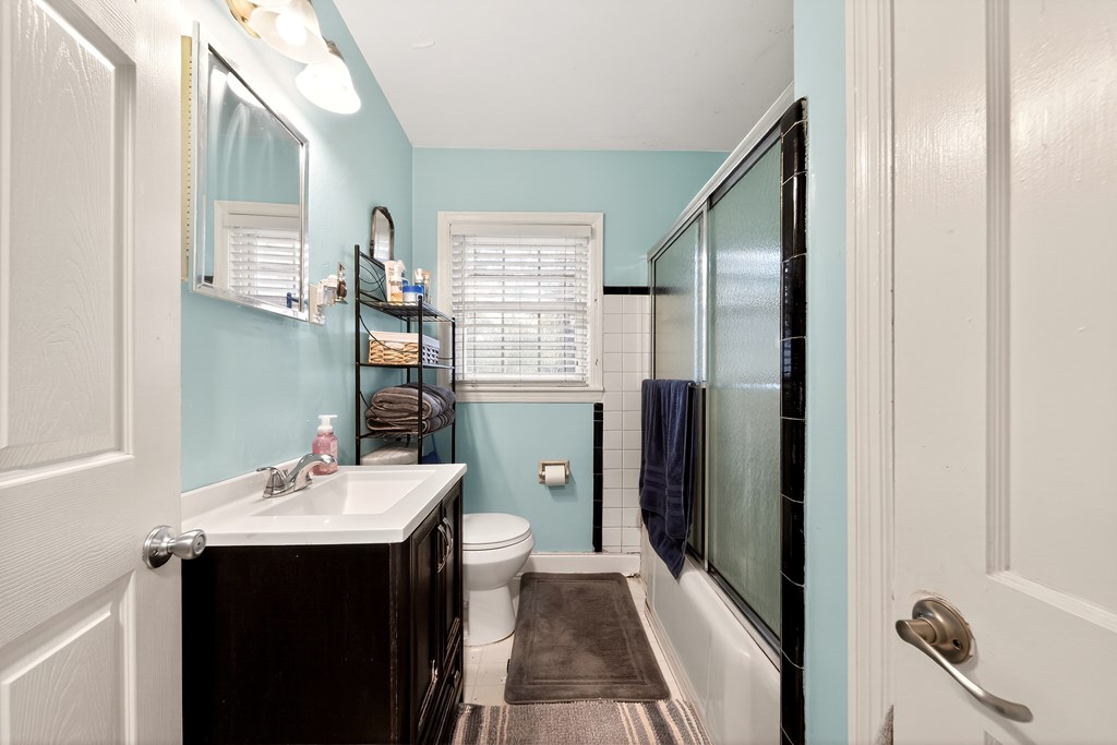 2963 Grant Road Columbus, GA 31907 - Photo 11 of 15 a bathroom with a sink a toilet and shower