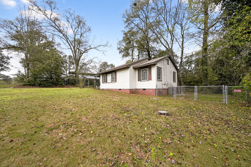 2963 Grant Road Columbus, GA 31907 - Photo 3 of 15 a house view with a garden space