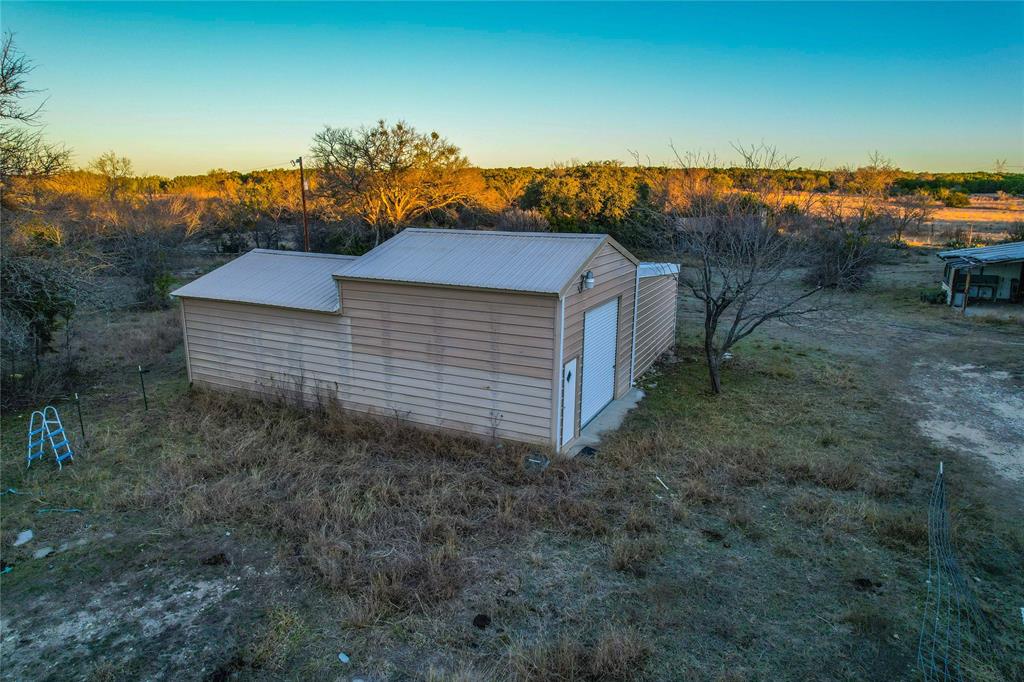391 County Road 4717 Kempner, TX 76539 - Photo 18 of 40 a view of a house with a yard and mountain view