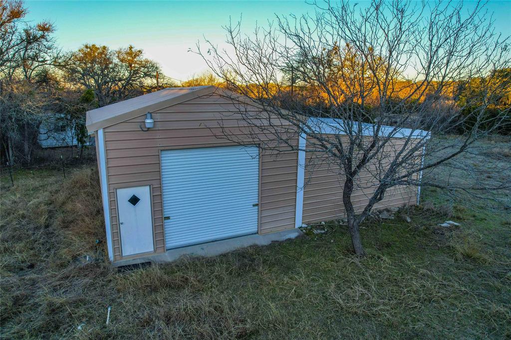 391 County Road 4717 Kempner, TX 76539 - Photo 20 of 40 a backyard of a house with lots of green space