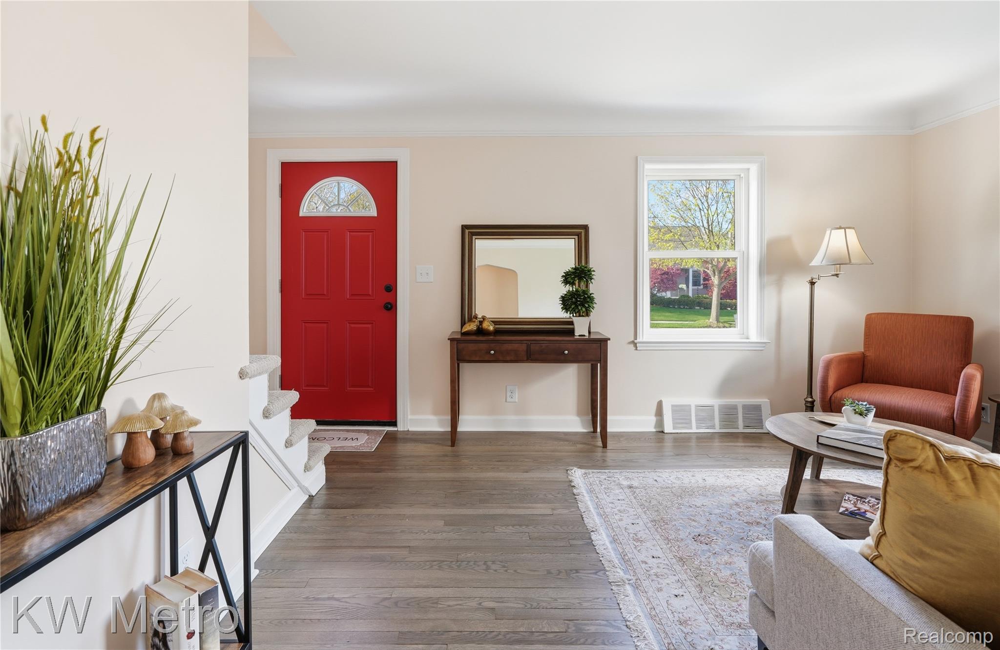 1861 Harvard Road Berkley, MI 48072 - Photo 4 of 27 Entryway featuring dark wood flooring and ornamental molding