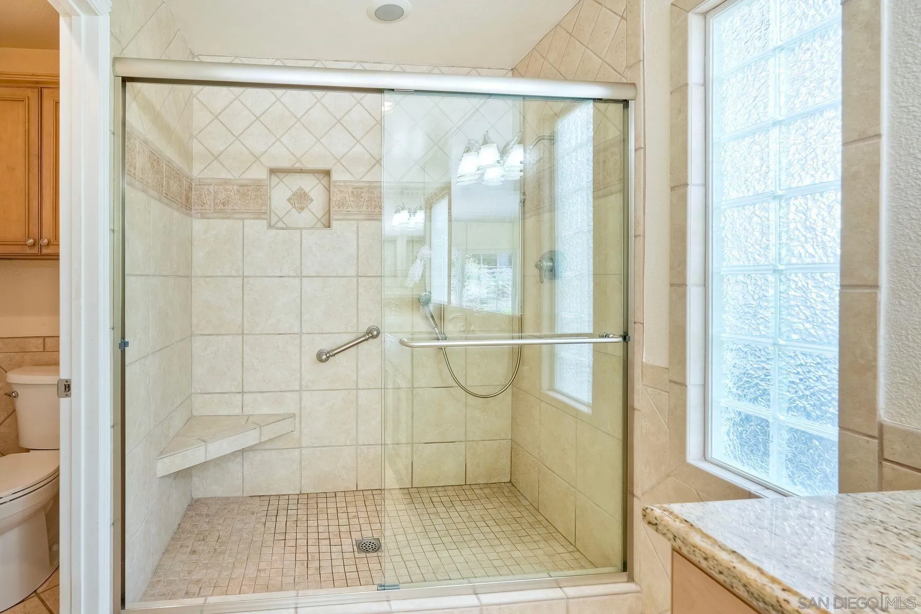 13145 Silver Saddle Lane Poway, CA 92064 - Photo 19 of 53 a bathroom with a shower