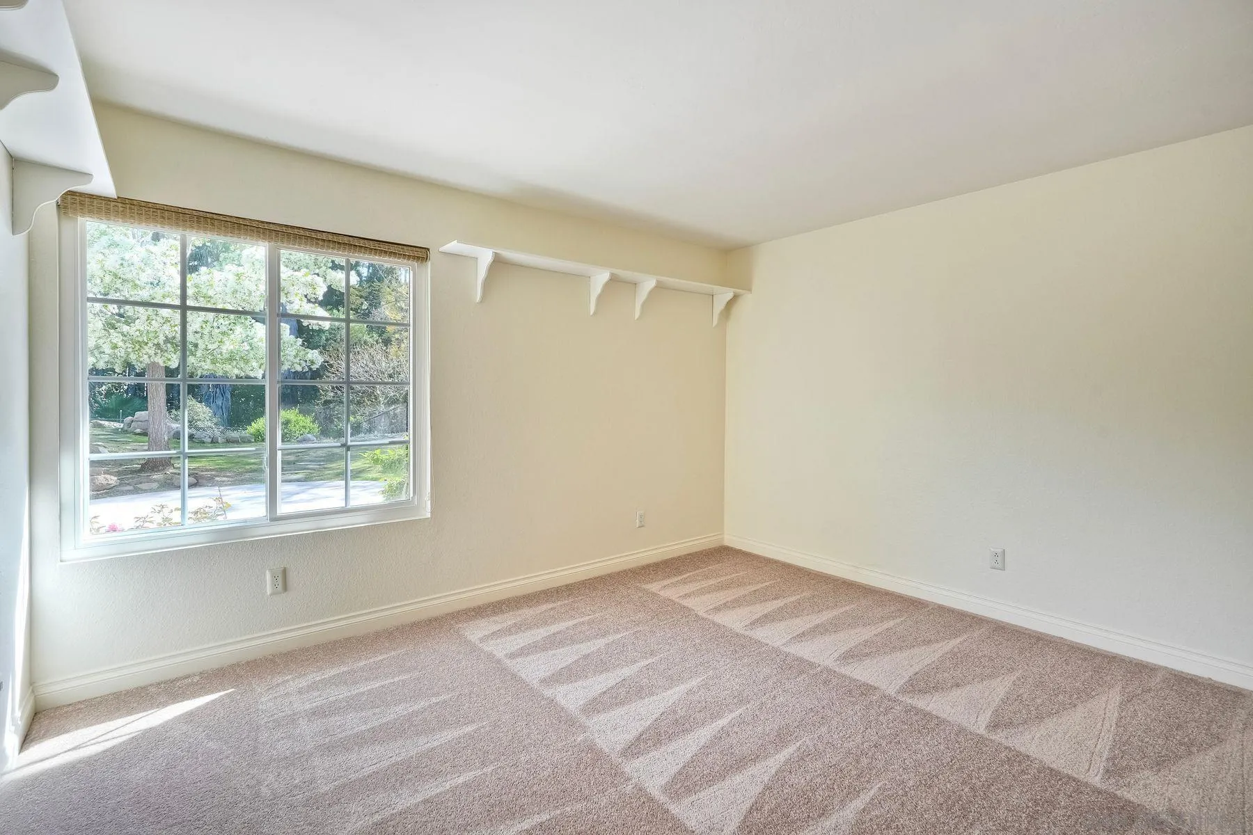 13145 Silver Saddle Lane Poway, CA 92064 - Photo 28 of 53 a view of an empty room with a window