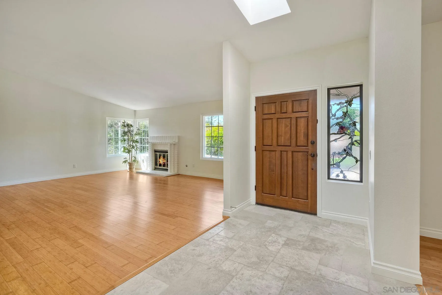 13145 Silver Saddle Lane Poway, CA 92064 - Photo 5 of 53 an empty room with windows and cabinet