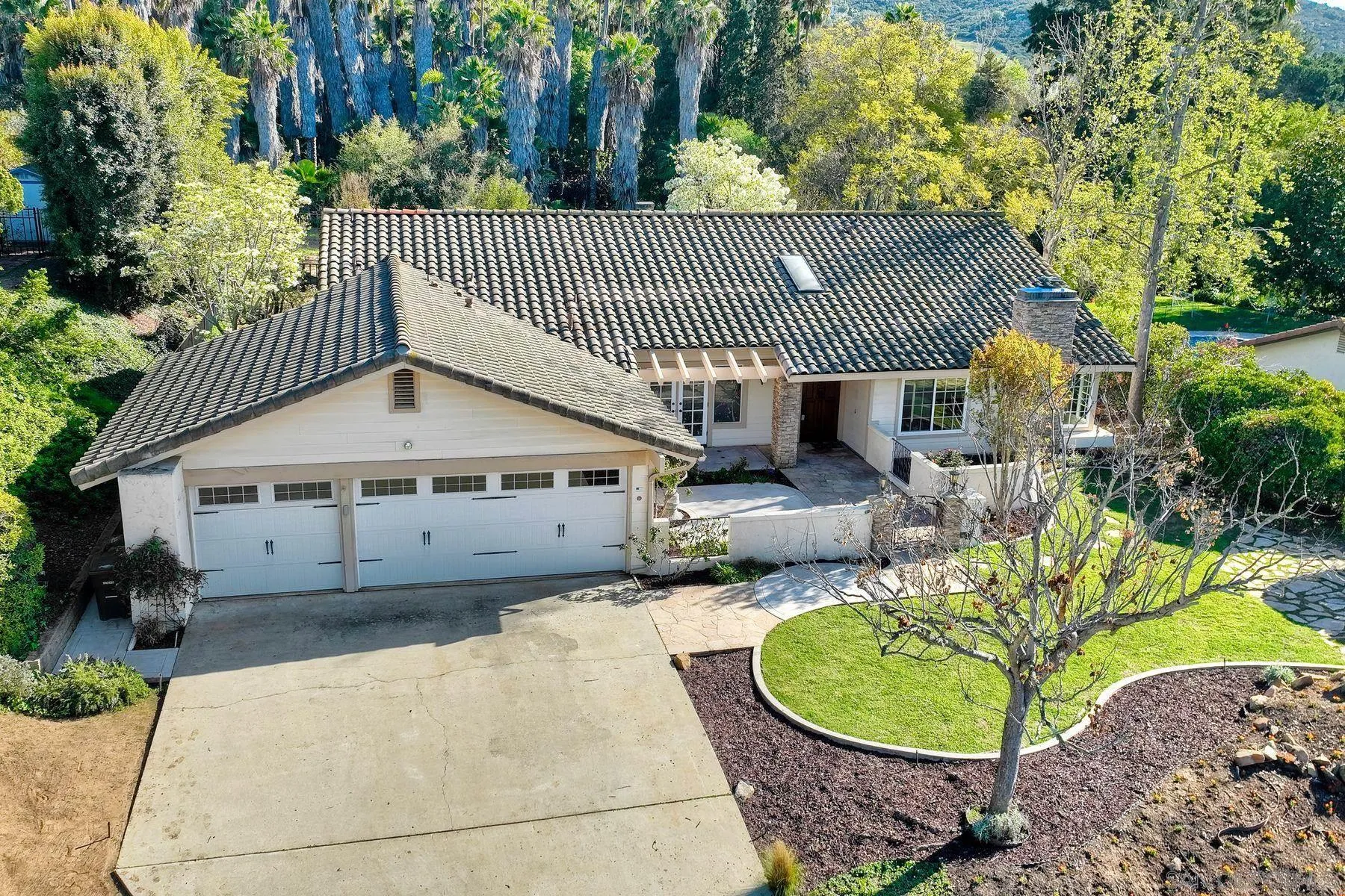 13145 Silver Saddle Lane Poway, CA 92064 - Photo 52 of 53 a view of a house with backyard and sitting area