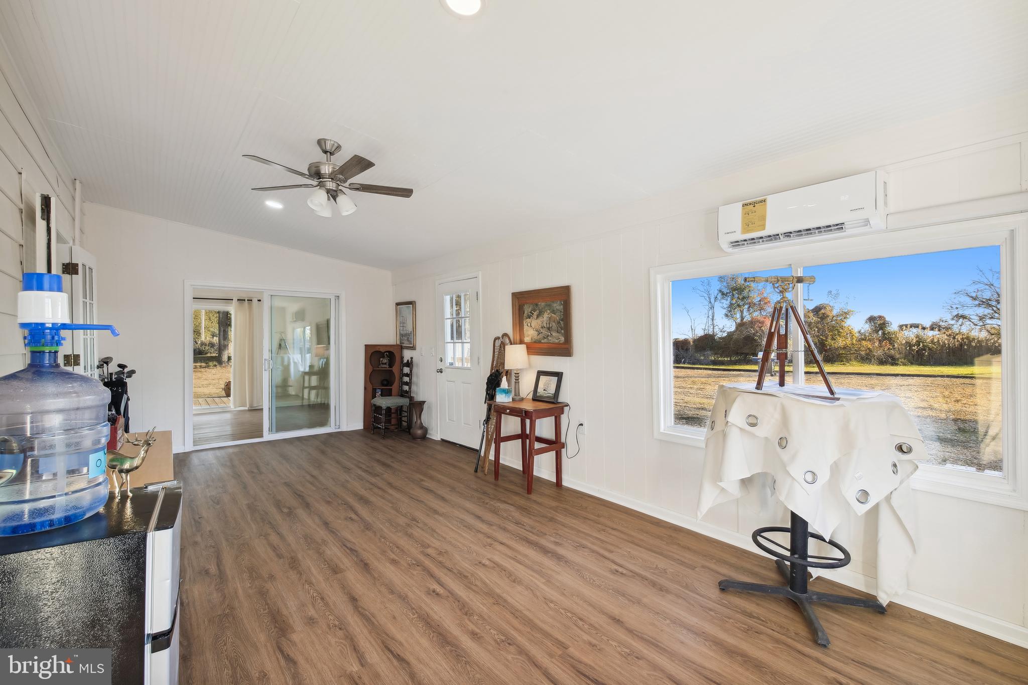 23391 Custom House Road Deal Island, MD 21821 - Photo 16 of 64 Family Room to Sunroom