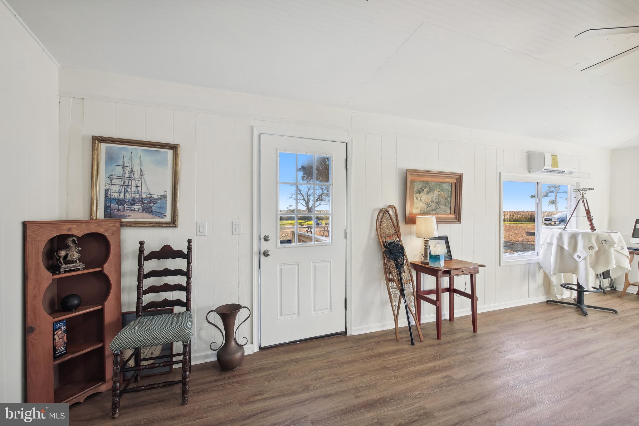23391 Custom House Road Deal Island, MD 21821 - Photo 17 of 64 Family Room to Side Door Exit