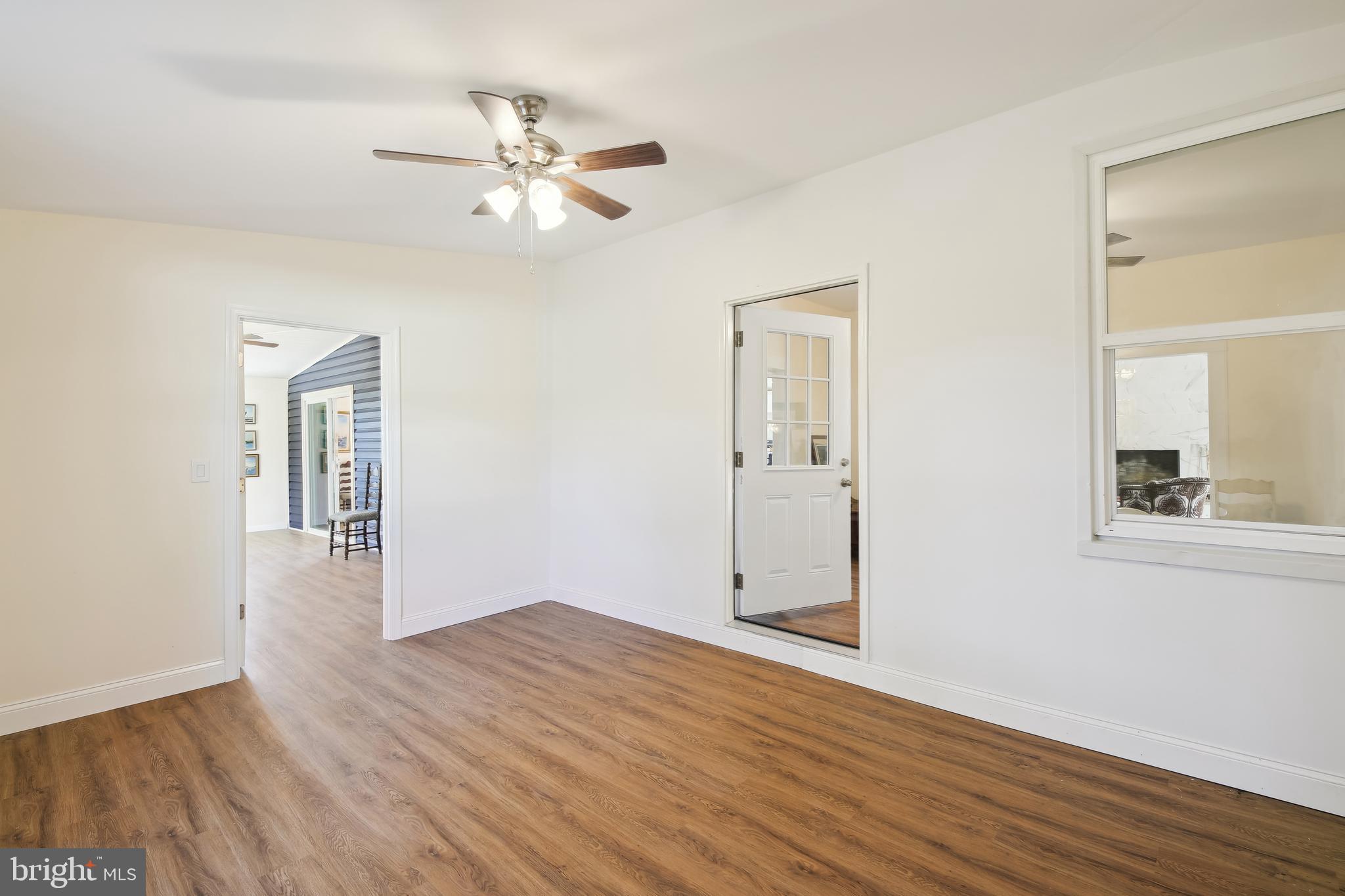 23391 Custom House Road Deal Island, MD 21821 - Photo 21 of 64 17'x12' Master Bedroom to Sunroom