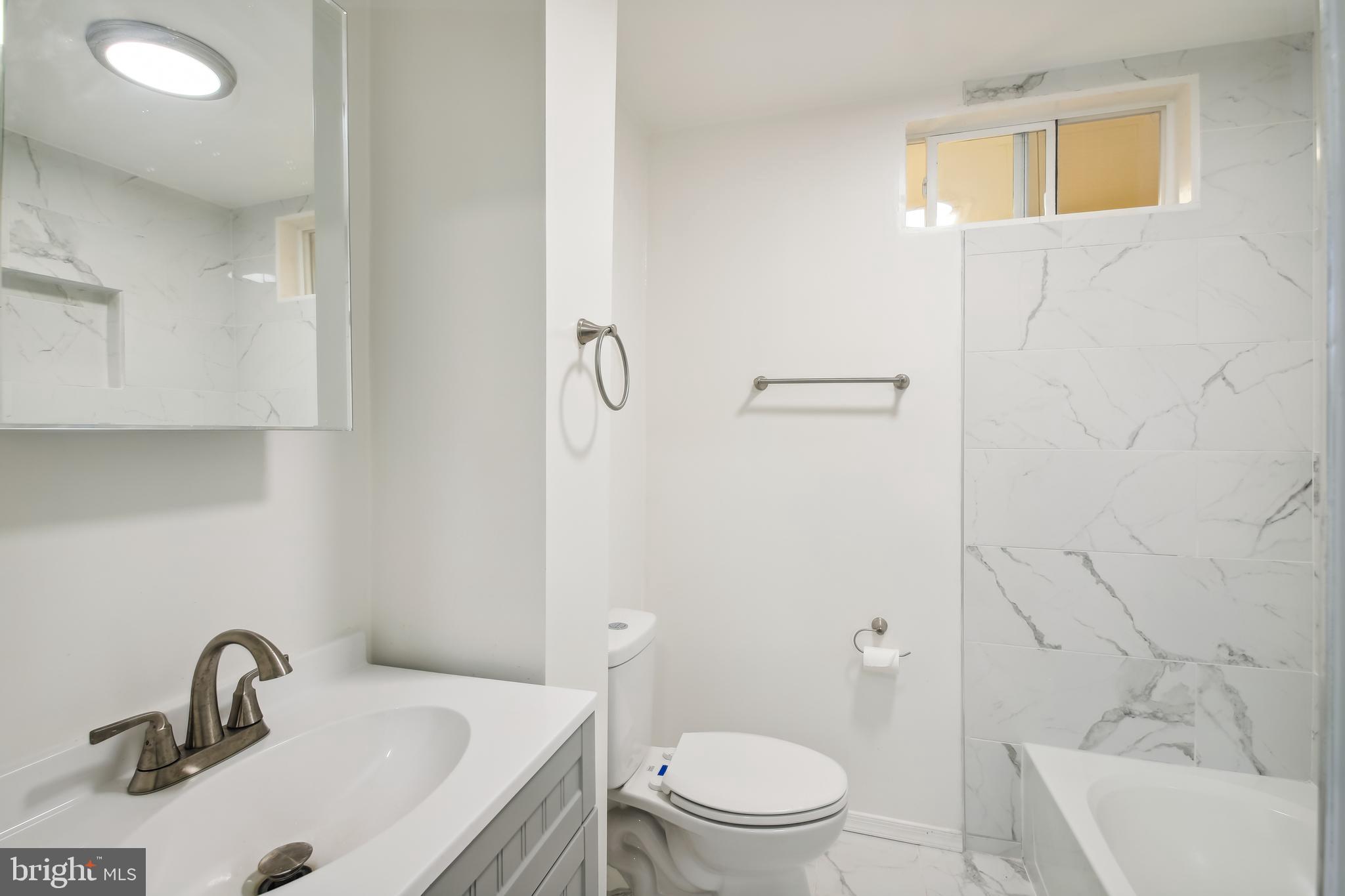 23391 Custom House Road Deal Island, MD 21821 - Photo 25 of 64 1st Floor Guest Bathroom with Tub and Shower