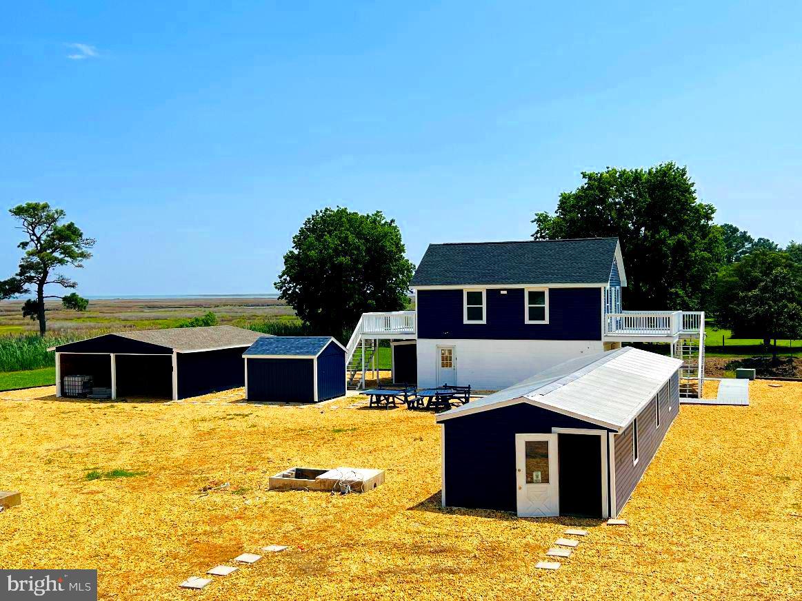 23391 Custom House Road Deal Island, MD 21821 - Photo 35 of 64 Outbuildings View from Bedroom 2 and Office