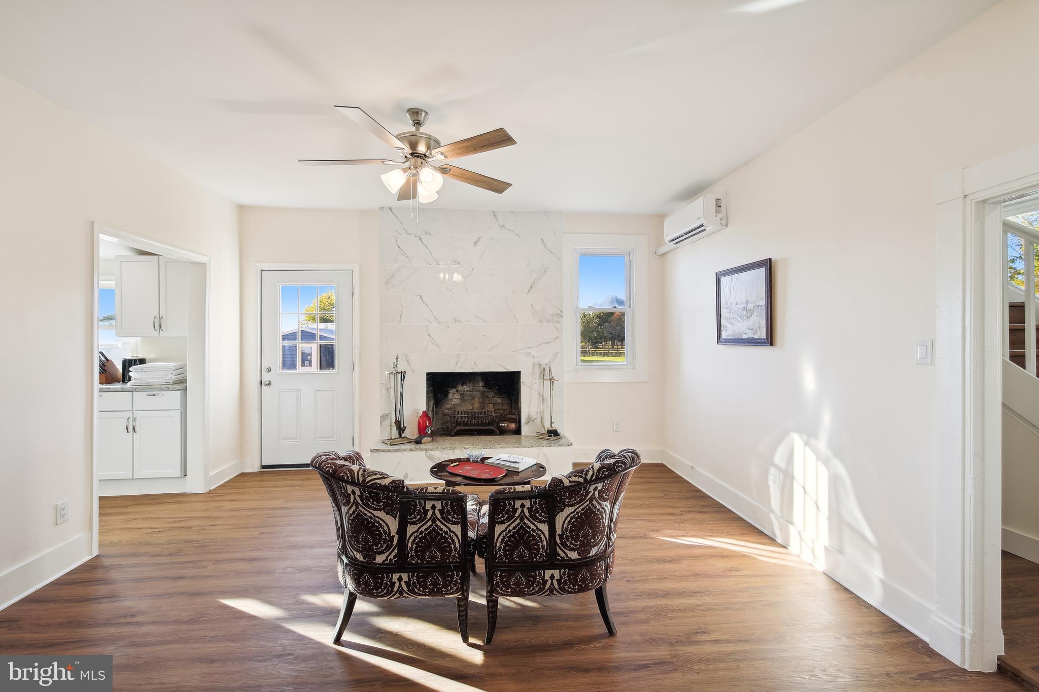 23391 Custom House Road Deal Island, MD 21821 - Photo 4 of 64 15'x16' Living Room has a Marble Fireplace