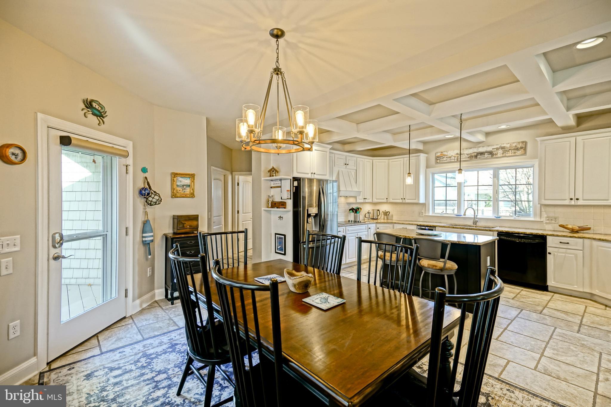 412 Mulberry Street Lewes, DE 19958 - Photo 13 of 74 a view of a dining room with furniture and wooden floor