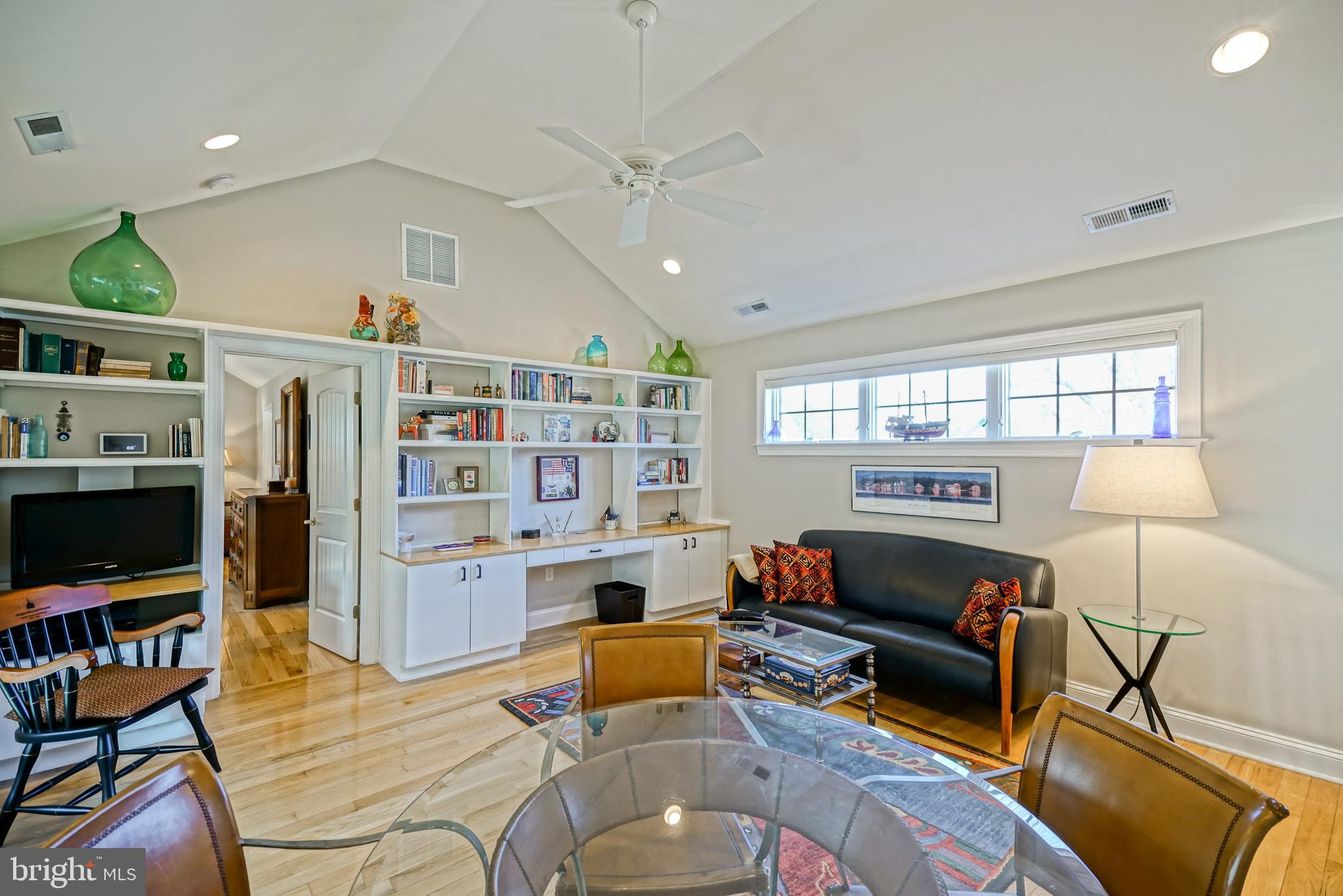 412 Mulberry Street Lewes, DE 19958 - Photo 35 of 74 a living room with furniture a rug and a flat screen tv