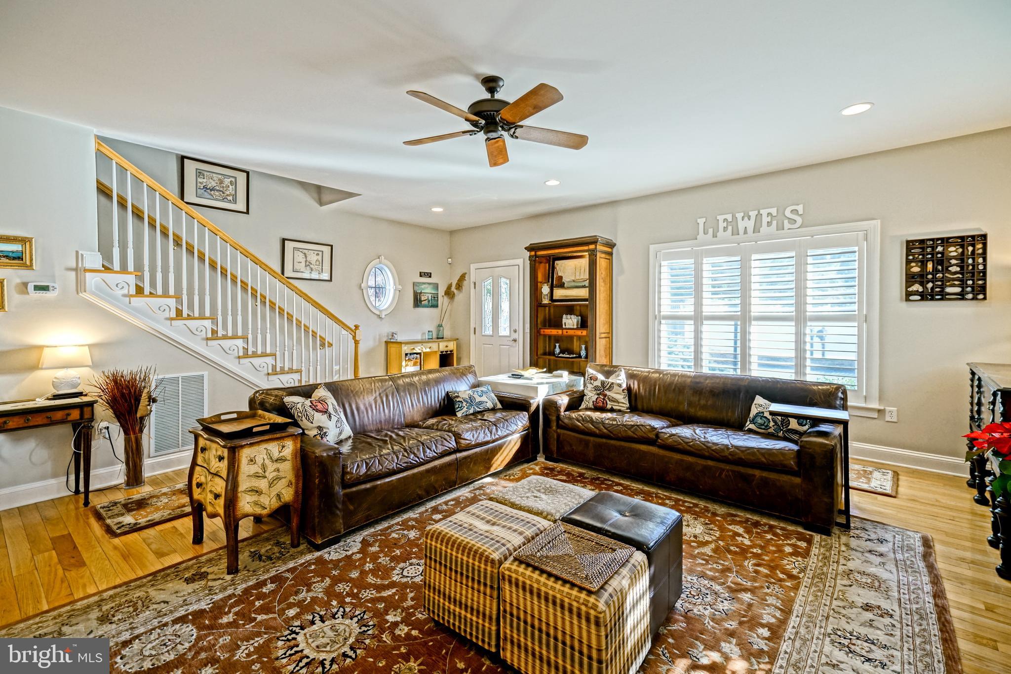 412 Mulberry Street Lewes, DE 19958 - Photo 8 of 74 a living room with furniture ceiling fan and a window