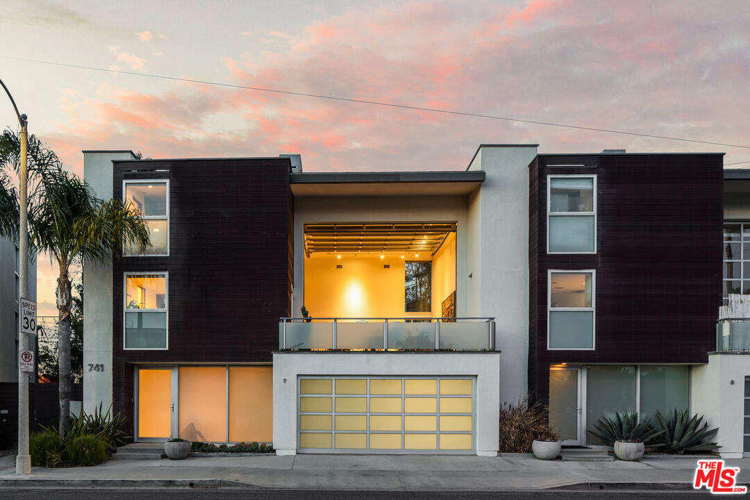 a house view with a swimming pool