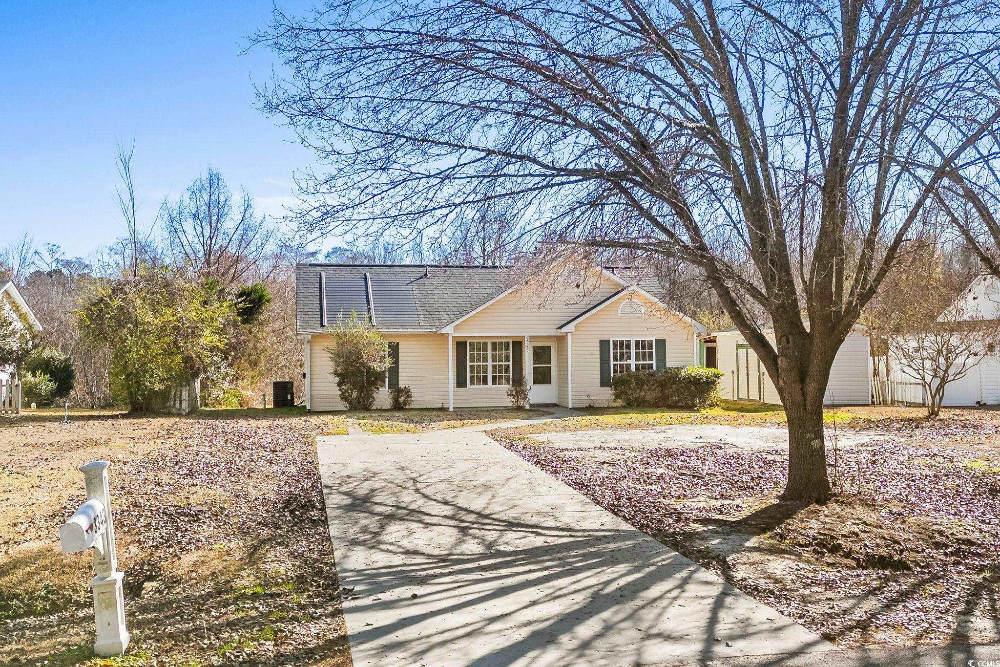 View of front of property featuring roof with shingles