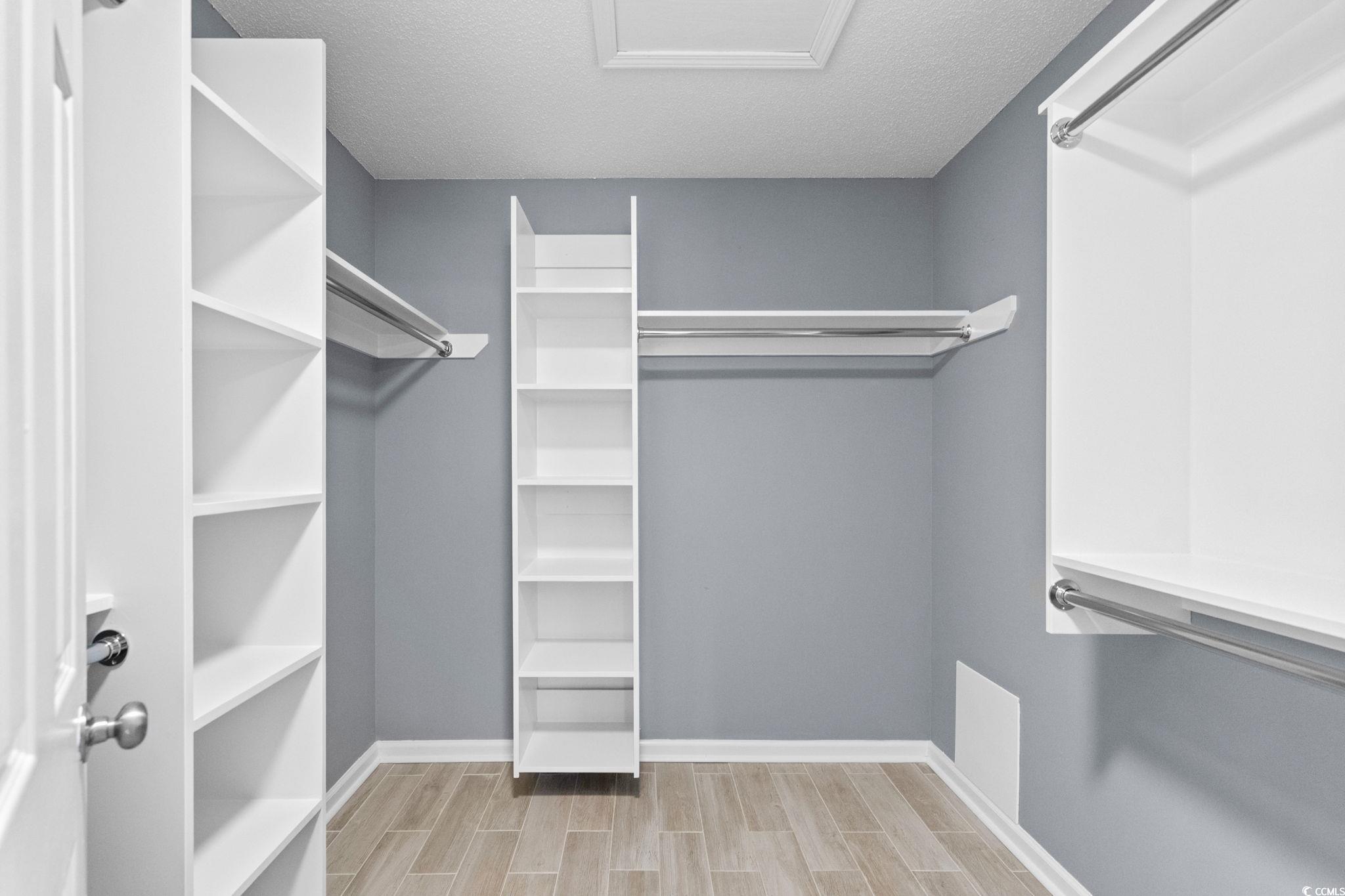 3343 New Road Conway, SC 29527 - Photo 19 of 36 Walk in closet featuring wood finish floors