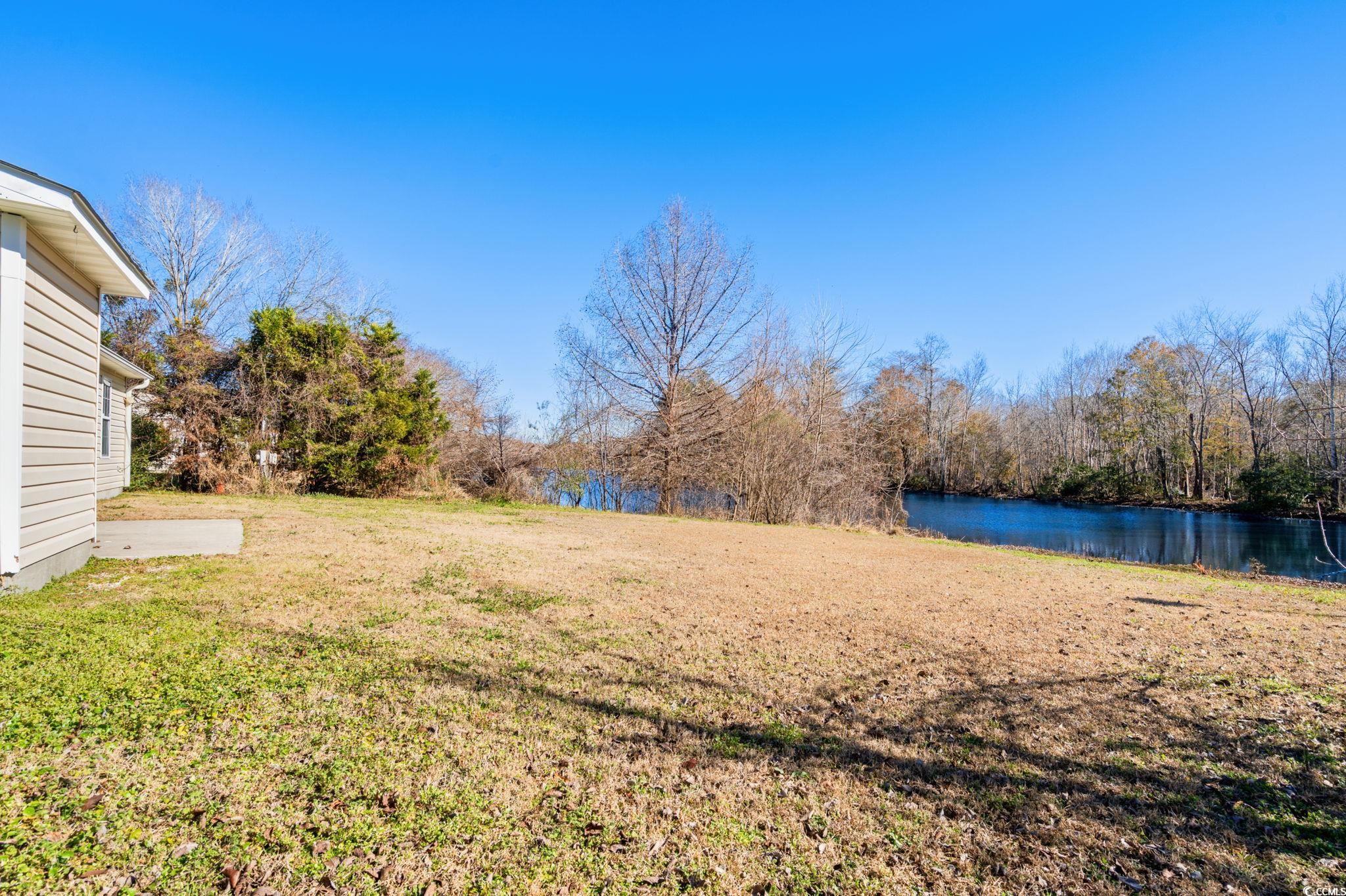 3343 New Road Conway, SC 29527 - Photo 26 of 36 View of grassy yard with a water view
