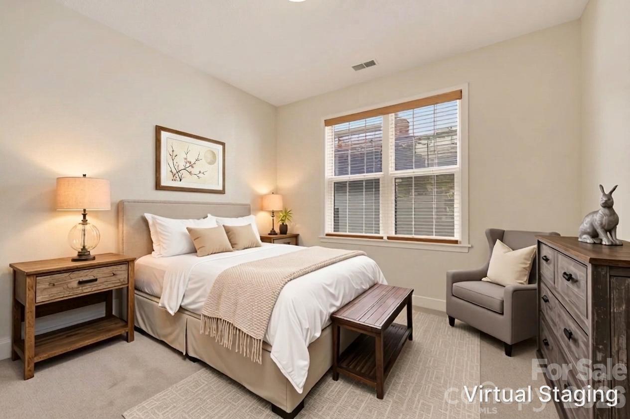 268 Farm Valley Road Fletcher, NC 28732 - Photo 23 of 30 a bedroom with a bed and a window
