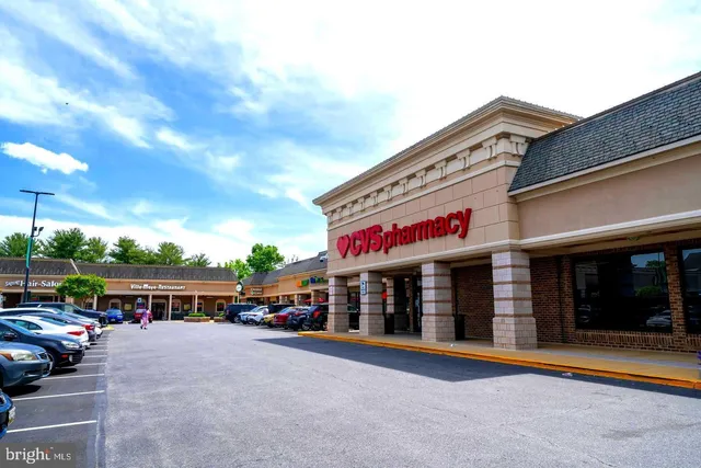 a front view of building with street