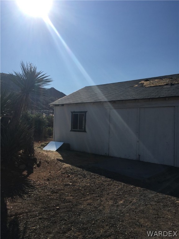 4238 West Ranch Road Golden Valley, AZ 86413 - Photo 14 of 45 a backyard of a house with a yard