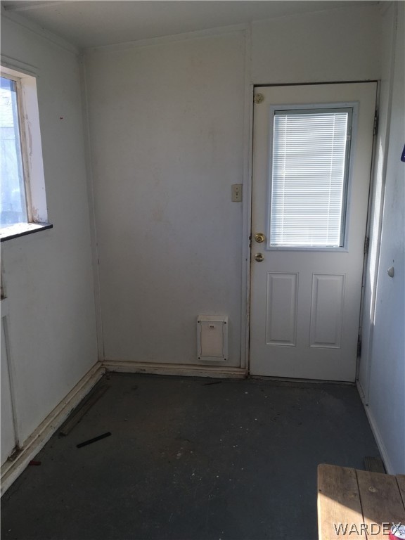 4238 West Ranch Road Golden Valley, AZ 86413 - Photo 16 of 45 an empty room with a window
