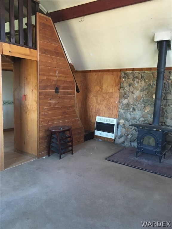 4238 West Ranch Road Golden Valley, AZ 86413 - Photo 29 of 45 a view of an empty room with a fireplace