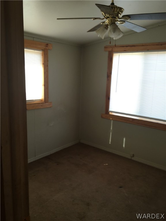 4238 West Ranch Road Golden Valley, AZ 86413 - Photo 35 of 45 an empty room with a window