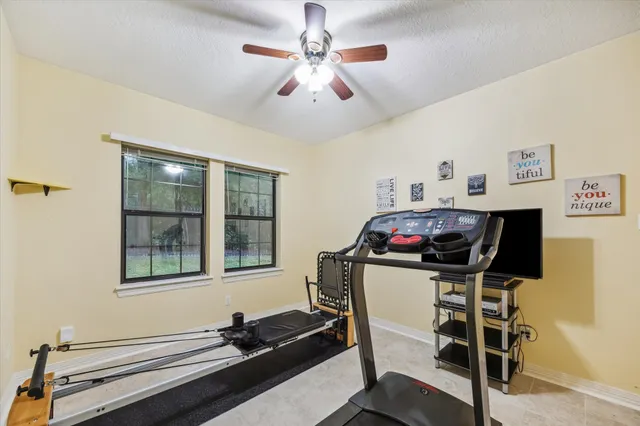 a room with a couch and a stove top oven