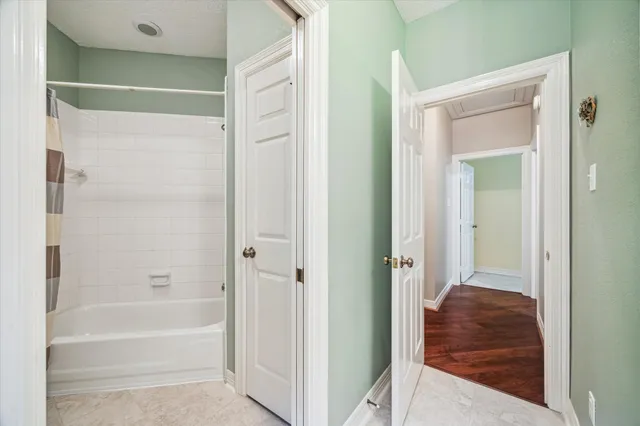 a view of bathroom with bathtub